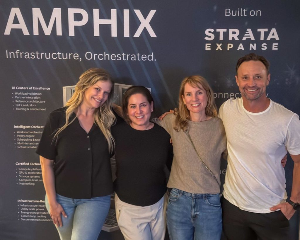 RAVEL team at GTC 2026 standing in front of AMPHIX Infrastructure Orchestrated display with Strata Expanse branding